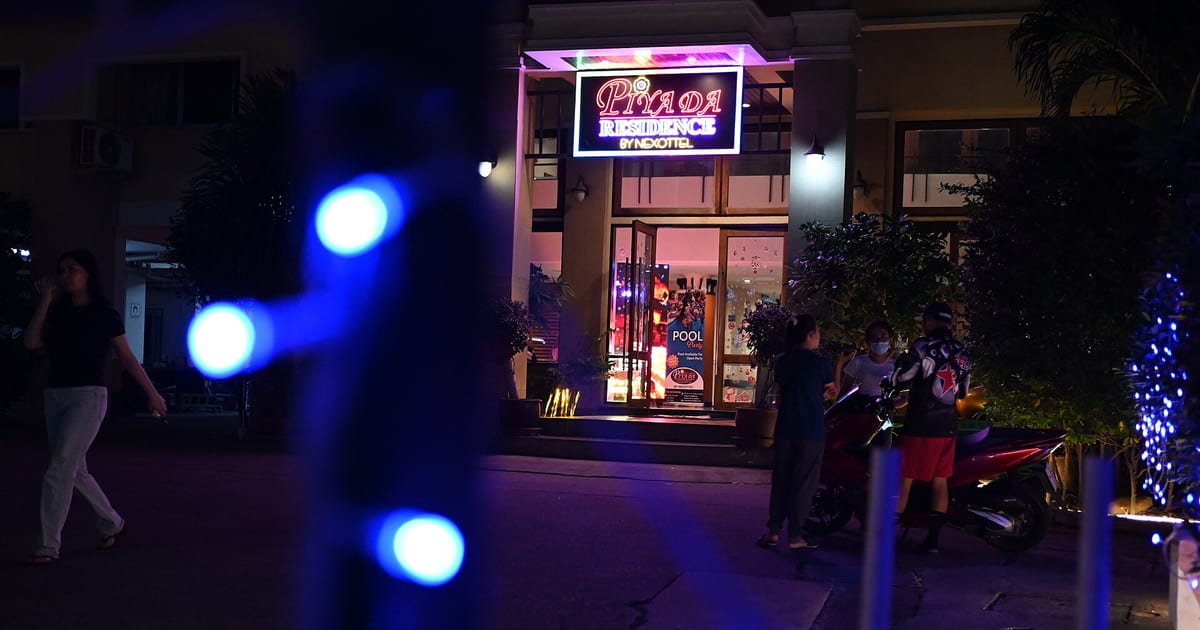 DFC 4706 Neon nights at a cozy Chon Buri bar - soft blue lights lead the way to an inviting glow and late-night chatter.jpg